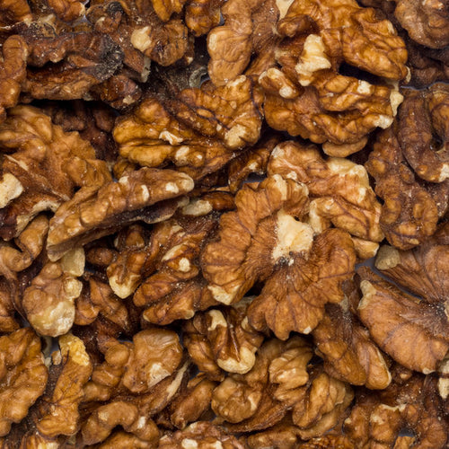 Close up walnuts halved organic.