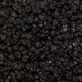 Close up of organic currants or corinth raisins.